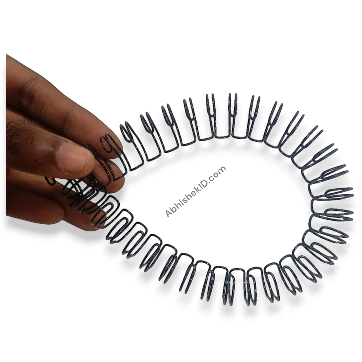 Angled perspective of 11mm A4 Black Wiro Binding Rings for business proposal presentations.