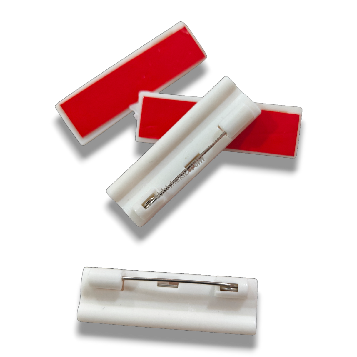 Side profile of 40x13mm self-adhesive badge pin back showing peel-and-stick application for staff name tags.