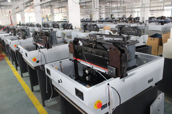 E490T 19 Inch Electric Paper Cutter for high volume print finishing and packaging material reduction.