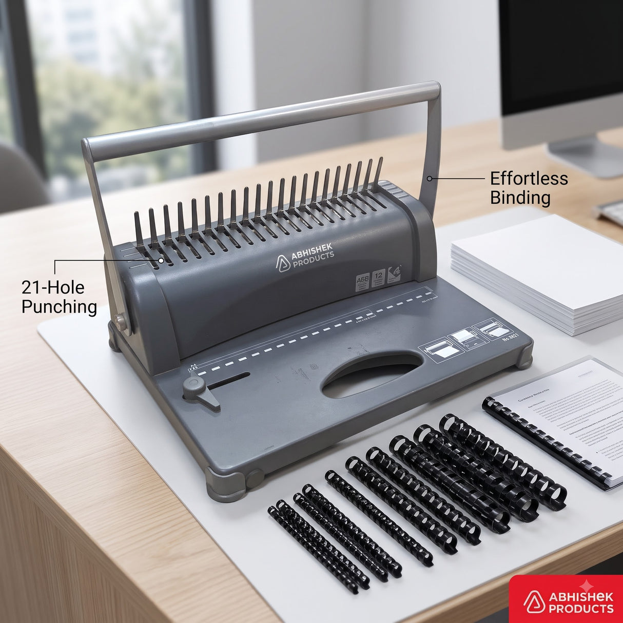 Comb Binding Machine for Office – A4 21-Slot, gray metal, with black binding combs, for effortless binding.