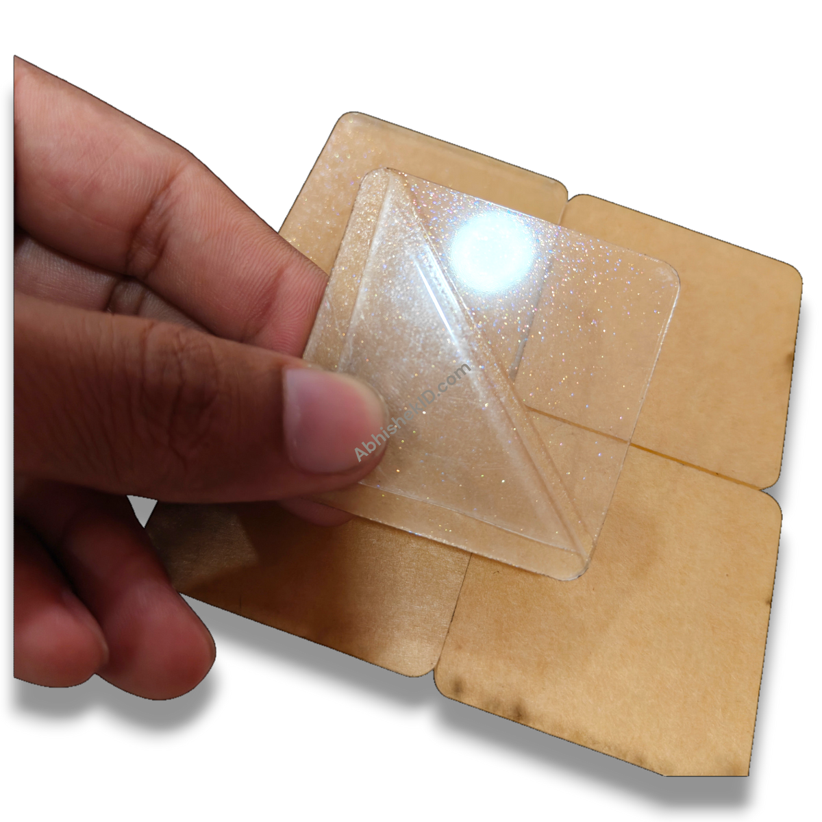 49mm acrylic puzzle DIY tiles, 2mm clear adhesive sparkle gumming square round-corner puzzle pieces being peeled from backin…