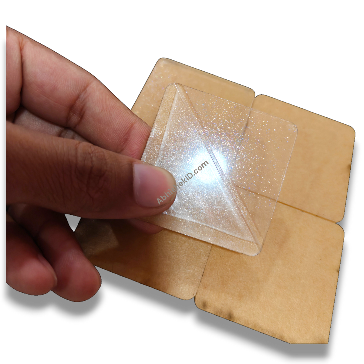 49mm acrylic puzzle DIY tiles, 2mm clear adhesive sparkle gumming square round-corner puzzle pieces held by hand.