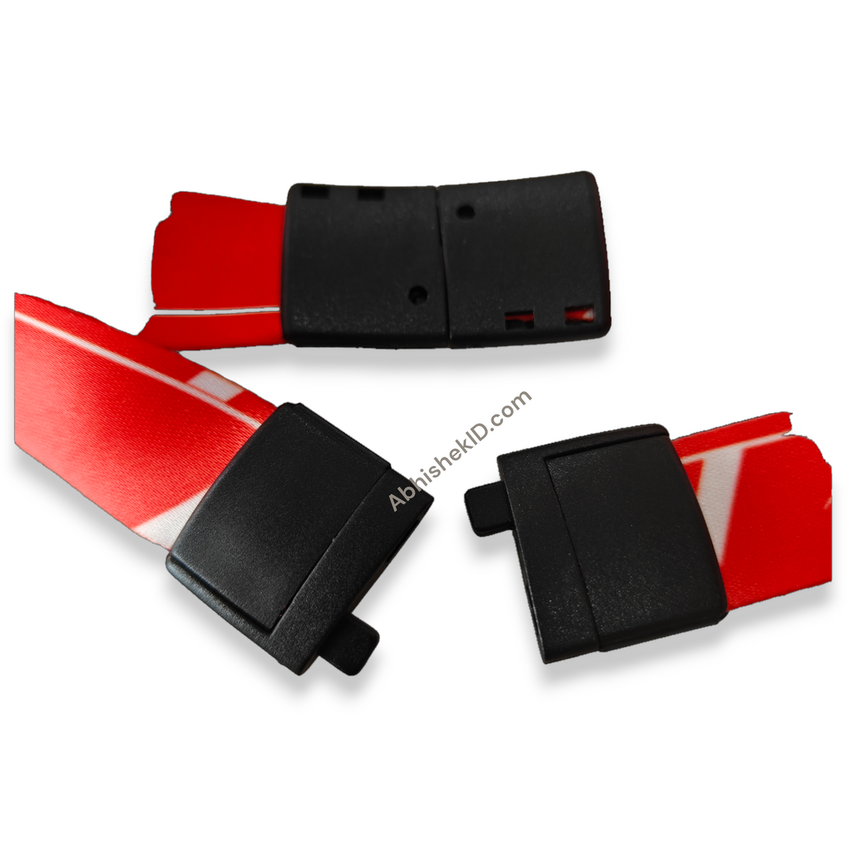 Matched pair of black plastic central joints showing lock mechanism for 16mm lanyard fabrication