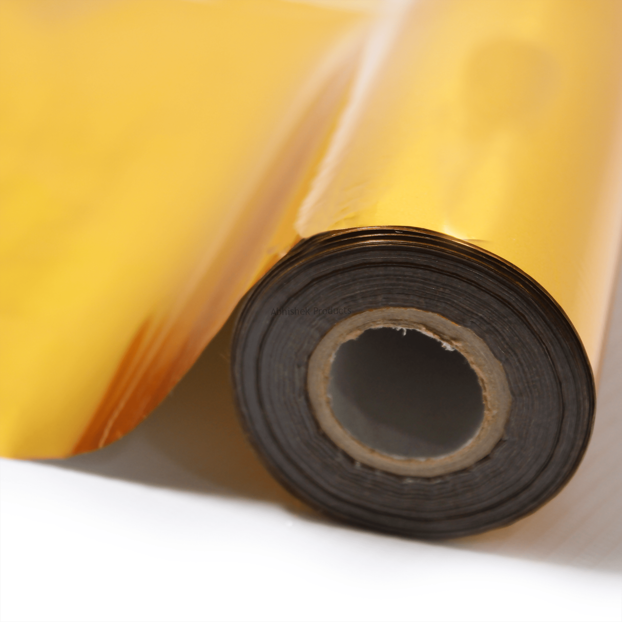 12 Inch x 112 Meter Gold Foil Metallic Roll (LaserJet) for printing, shiny gold metallic material on a roll.