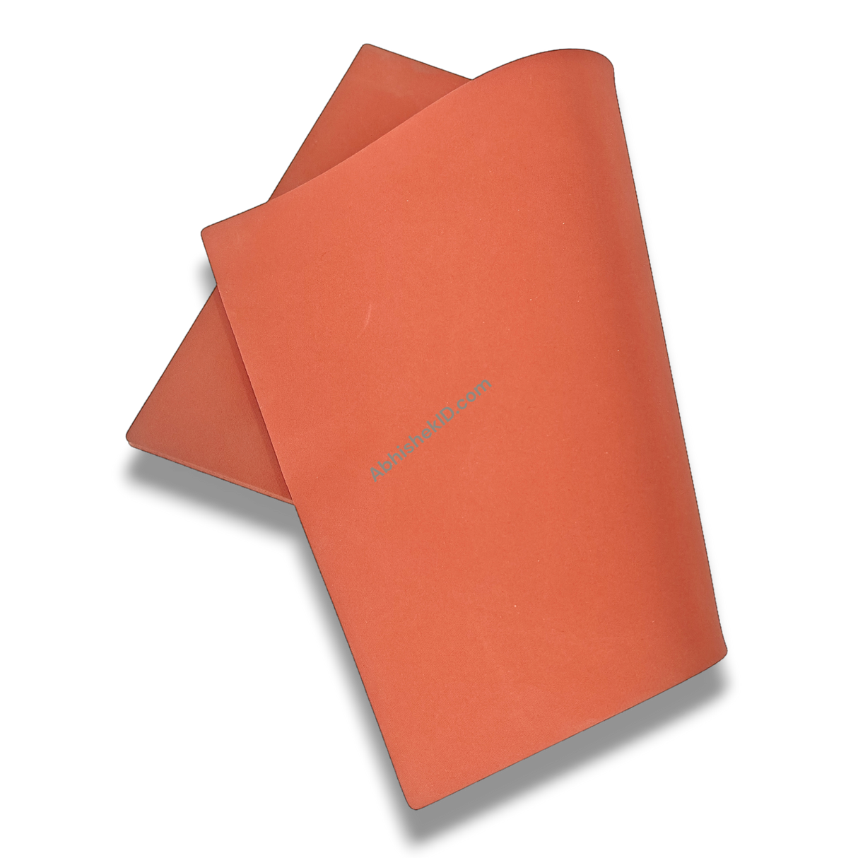 Angled edge view of 16x24 inch heat press silicone bed for industrial sublimation equipment.