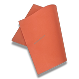 Angled edge view of 16x24 inch heat press silicone bed for industrial sublimation equipment.