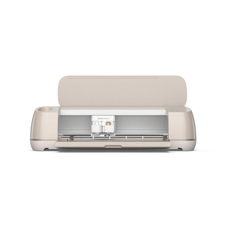 Cricut Maker 4 smart cutting machine hero shot with Design Space app on tablet