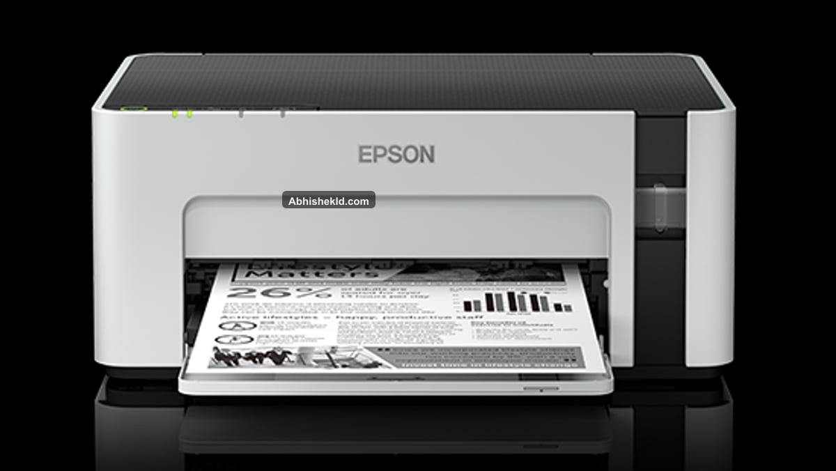 Front compact view of Epson EcoTank M1120 monochrome ink tank printer on office desk