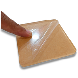 74mm square clear acrylic paperweight DIY blank for desk, inserts, and gifts, with protective film being peeled.