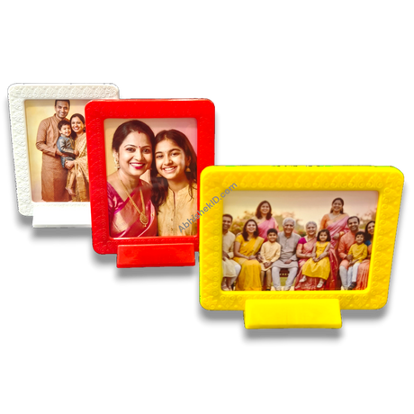 Colorful magnetic tabletop frames 3x4 inch. White, red, yellow frames displaying family portraits. Home decor.