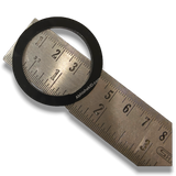 Button Badge Rings 58mm 44mm die height washer spacer, black plastic, on a metal ruler for size reference.