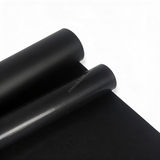 Premium Black Teflon Sheet for Heat Press & Sublimation, rolled non-stick PTFE material for heat transfer craft projects.