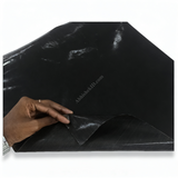Hand lifting Premium Black Teflon Sheet for heat press and sublimation. Flexible non-stick PTFE for heat transfer protection.