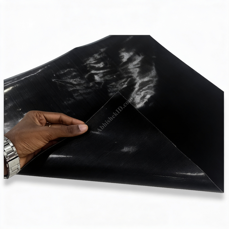 Premium Black Teflon Sheet for Heat Press & Sublimation, glossy non-stick material being peeled for heat transfer.